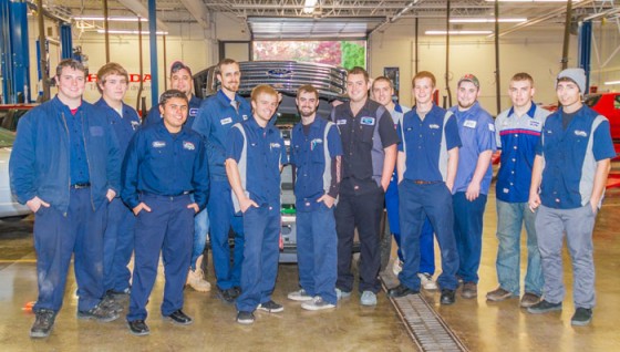 Some of the Ford ASSET program students in front of one of the Ford’s donated vehicles.