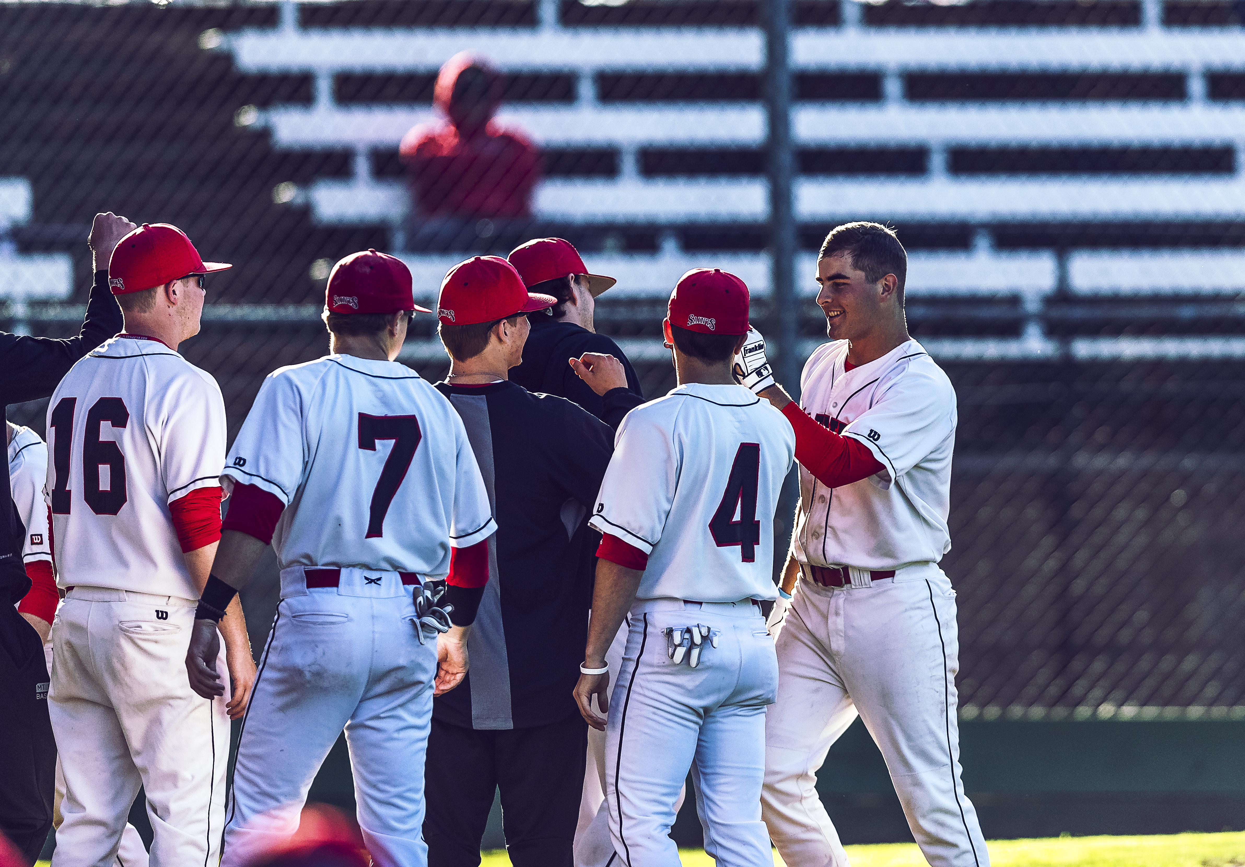 Saints fist bumping Dawson Day after he ran in from his homer